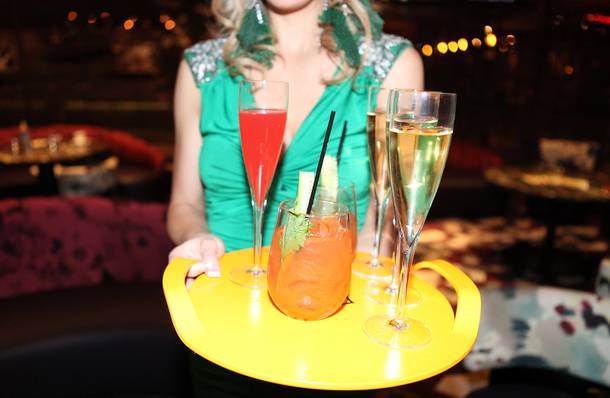 Drinks are served to the media during a preview of the new Nobu Restaurant at Caesars Palace in Las Vegas on Friday, February 1, 2013.