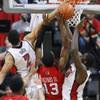 UNLV's Khem Birch and Anthony Bennett defend a shot by San Diego State guard Winston Shepard during their game Saturday, Feb. 16, 2013. UNLV won the game 72-70 to sweep the regular season series. UNLV's Khem Birch and Anthony Bennett defend a shot by San Diego State guard Winston Shepard during their game Saturday, Feb. 16, 2013. UNLV won the game 72-70 to sweep the regular season series.