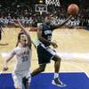 Photo: Centennial's Marcus Allen drives to the basket pas Photo: Centennial's Marcus Allen drives to the basket pas