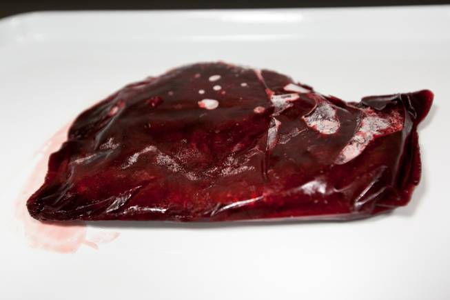 A donated placenta defrosts in -40 degrees in preparation for encapsulation for the first-of-its-kind study on the practice of women ingesting their placenta after childbirth conducted by Dr. Daniel Benyshekin the Metabolism, Anthropometry and Nutrition lab at UNLV in Las Vegas February 22, 2013.
