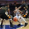 Photo: Desert Pines Julian Jacobs passes between Clark 's Photo: Desert Pines Julian Jacobs passes between Clark 's