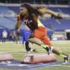 Former UNLV linebacker John Lotulelei runs a drill at the NFL football scouting combine in Indianapolis, Monday, Feb. 25, 2013. Former UNLV linebacker John Lotulelei runs a drill at the NFL football scouting combine in Indianapolis, Monday, Feb. 25, 2013.