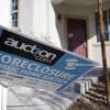 Photo: An auction sign for a foreclosed home in Las Vegas Photo: An auction sign for a foreclosed home in Las Vegas