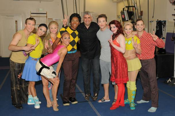 Taylor Hicks is flanked by cast members of