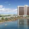 This artist's rendering released Wednesday, March 27, 2013, by Wynn Resorts shows a proposed resort casino on the banks of the Mystic River in Everett, Mass. This artist's rendering released Wednesday, March 27, 2013, by Wynn Resorts shows a proposed resort casino on the banks of the Mystic River in Everett, Mass.