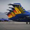 Photo: A Southwest airline taxis by parked Allegiant Air Photo: A Southwest airline taxis by parked Allegiant Air