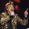 Mick Jagger sings as The Rolling Stones perform during their show at MGM Grand Garden Arena on Saturday, May 11, 2013. Mick Jagger sings as The Rolling Stones perform during their show at MGM Grand Garden Arena on Saturday, May 11, 2013.