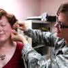 Photo: Lt. Col. (Dr.) Heather Pickett performs acupunctur Photo: Lt. Col. (Dr.) Heather Pickett performs acupunctur