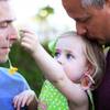 Greg Flamer, left, with his partner Fletcher Whitwell play with their daughter Hudson Whitwell, 2, outside their home in Las Vegas on Wednesday, May 22, 2013. Greg Flamer, left, with his partner Fletcher Whitwell play with their daughter Hudson Whitwell, 2, outside their home in Las Vegas on Wednesday, May 22, 2013.