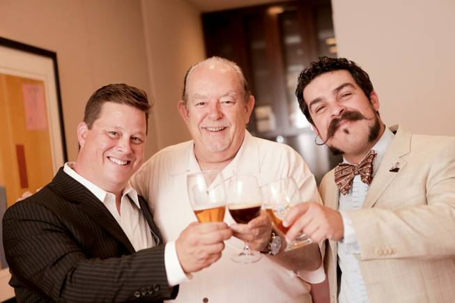 Robin Leach is flanked by beer cicerones Samuel Merritt and Russell Gardner.