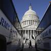 Photo: The Capitol Dome is seen between two U.S. Army Ban Photo: The Capitol Dome is seen between two U.S. Army Ban