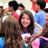 Photo: Emma Cole, 10, talks with friends during Summer Fo Photo: Emma Cole, 10, talks with friends during Summer Fo