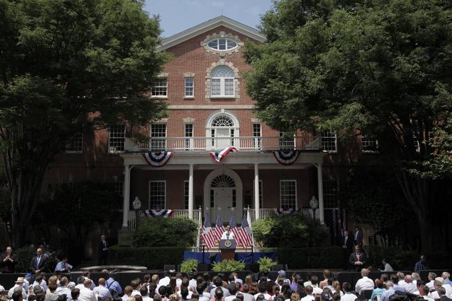 President Barack Obama speaks in front of Old North, Georgetown University's oldest building, about climate change at Georgetown University in Washington, Tuesday, June 25, 2013. The president is proposing sweeping steps to limit heat-trapping pollution from coal-fired power plants and to boost renewable energy production on federal property, resorting to his executive powers to tackle climate change and sidestepping the partisan gridlock in Congress.