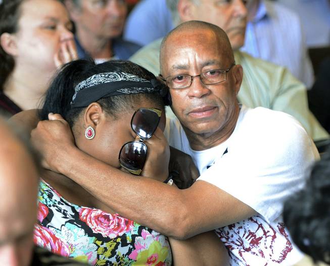 Family of Odin Lloyd react during the arraignment of former New England Patriots tight end Aaron Hernandez in Attleboro District Court Wednesday, June 26, in Attleboro, Mass. Hernandez was charged with murdering Lloyd, a 27-year-old semi-pro football player for the Boston Bandits, whose body was found June 17 in an industrial park in North Attleborough, Mass.