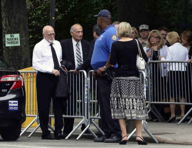 Actor Dominic Chianese, left, arrives at the the Cathedral Church of Saint John the Divine ahead of the funeral service for James Gandolfini, Thursday, June 27, 2013 in New York. Gandolfini, who played Tony Soprano in the HBO show "The Sopranos", died while vacationing in Italy last week.