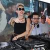 Miley Cyrus and DJ Obscene of Miami. Miley Cyrus and DJ Obscene of Miami.
