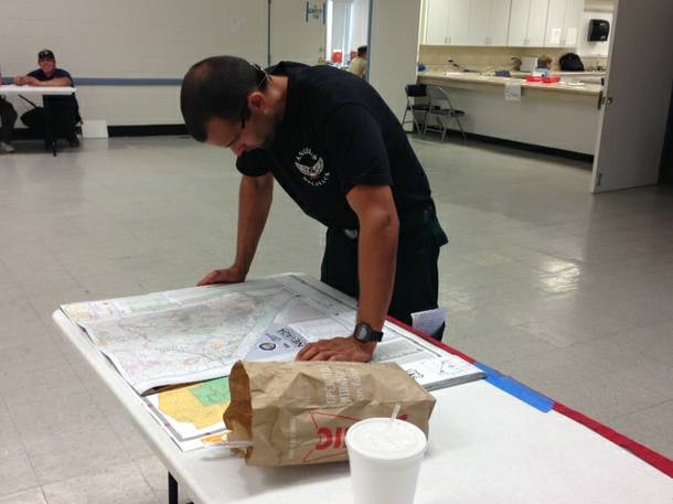 Ben Gotts, 28, a crew boss trainee for the Carpenter 1 fire on Mount Charleston prepares to help lead a crew of 17 college students who have been certified to fight wildfires. Gotts works as a firefighter on a helicopter crew out of Lancaster, Calif.