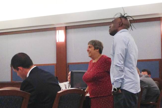 Laurie Diefenbach of the Clark County Public Defender's Office and rapper Coolio listen to Judge Melanie Tobiasson during Coolio's court appearance on a domestic violence charge. Diefenbach showed the rapper the deal offered by the prosecution as a friend of the court. Coolio refused the offer and was given 30 days to decide if he would like to represent himself in the case.