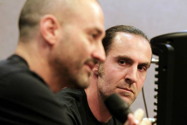 Joey Vanas, left, and Michael Cornthwaite of Huntridge Revival, LLC hold a community meeting at The Center in Las Vegas on Thursday, July 18, 2013 after exceeding their first fundraising goal to discuss the next steps toward reopening the historic Huntridge Theater.