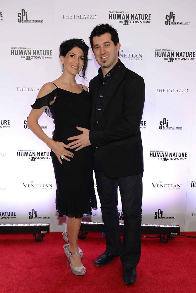 Marc Savard and wife Joanna arrives at the grand opening of "Smokey Robinson Presents Human Nature: The Motown Show" at The Venetian on Friday, Feb. 22, 2013.
