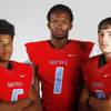Photo: Western High football players (from left) Xerexes Photo: Western High football players (from left) Xerexes