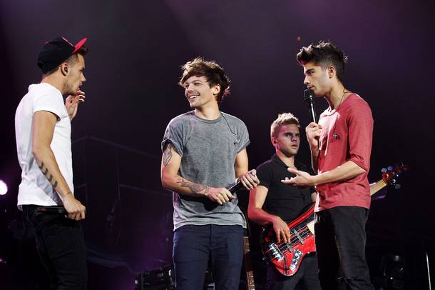 Liam Payne, Louis Tomlinson and Zayn Malik of One Direction perform at Mandalay Bay Events Center on Friday, Aug. 2, 2013.
