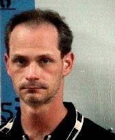 This undated booking photo released by the Bay County Sheriff's Office showing Nathan Louis Campbell, 38, from a 2008 arrest in Panama City, Fla.