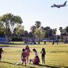 Photo: Kids play at Sunset Park in Las Vegas as an airpla Photo: Kids play at Sunset Park in Las Vegas as an airpla