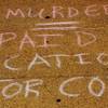 Chalk messages, such as this one, were written on sidewalks outside the Metro Police Headquarters and the Regional Justice Center. Chalk messages, such as this one, were written on sidewalks outside the Metro Police Headquarters and the Regional Justice Center.