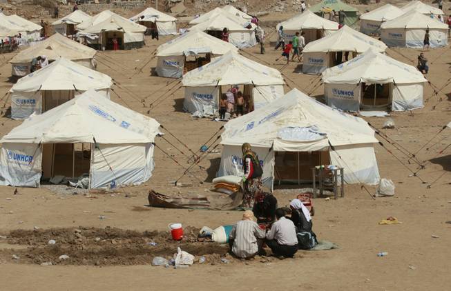 A general view of the Kawergost refugee camp in Irbil, 217 miles (350 kilometers) north of Baghdad, Iraq, Wednesday, Aug. 21, 2013. Around 34,000 Syrians, the vast majority of them Kurds, have fled the region over a five-day stretch and crossed the border to the self-ruled Kurdish region of northern Iraq.