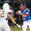Photo: Liberty quarterback Tyler Newman looks for an open Photo: Liberty quarterback Tyler Newman looks for an open