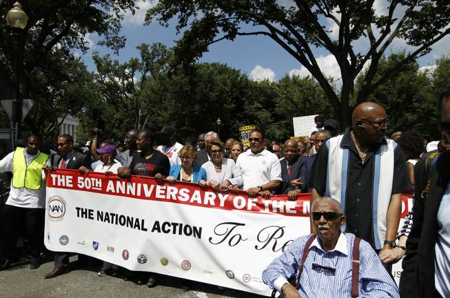 House Minority Leader Nancy Pelosi of Calif.; the Rev. Al Sharpton; Martin Luther King III; Rep. John Lewis, D-Ga.; Bernice King; Adreienne King; and Washington City Mayor Vincent Gray, among others, start the march during a rally to commemorate the 50th anniversary of the 1963 March on Washington at the Lincoln Memorial in Washington, D.C., on Aug. 24, 2013. Fifty years ago, Dr. Martin Luther King Jr. deliver his "I Have a Dream" speech during the March on Washington.