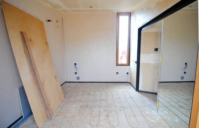 A bedroom is shown here at UNLV's Desert Sol project, a solar house that will operate entirely on renewable energy, on Friday, August 30, 2013. Desert Sol will travel to Irvine, Calif., in September to compete against 19 other teams from around the world in the U.S. Department of Energy's Solar Decathlon competition.