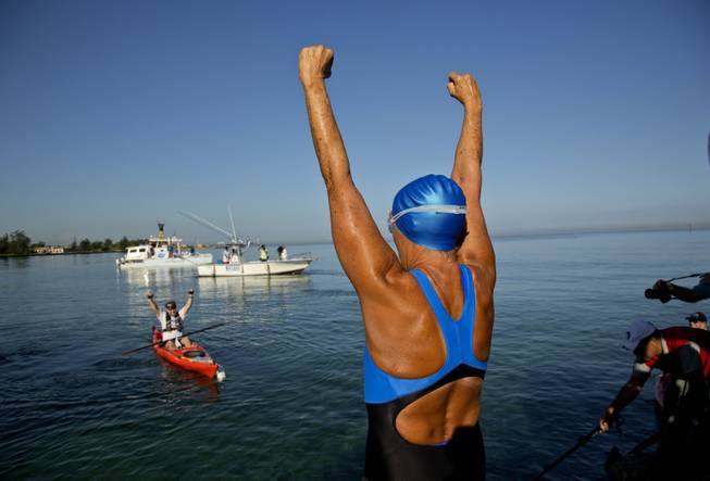 U.S. swimmer Diana Nyad, 64, greets her support team before her swim to Florida from Havana, Cuba, Saturday, Aug. 31, 2013. Endurance athlete Nyad launched another bid Saturday to set an open-water record by swimming from Havana to the Florida Keys without a protective shark cage.
