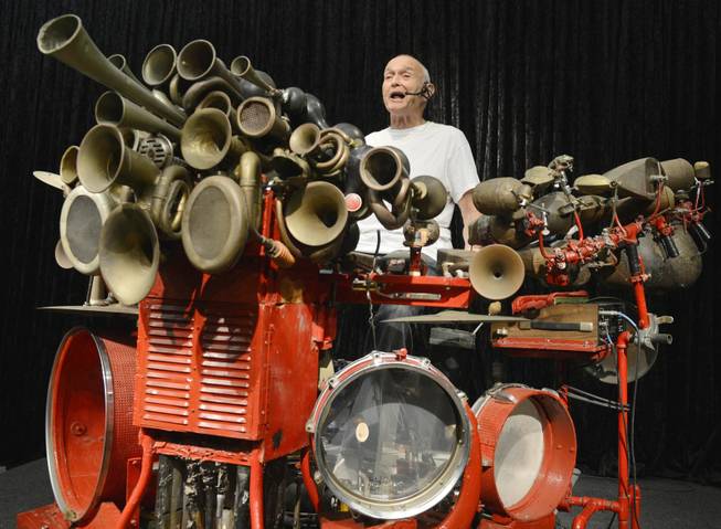 U.S artist Llyn Foulkes plays on his 'The Machine' (1979-2012) during the press preview of the dOCUMENTA (13) in Kassel, Germany, Wednesday, June 6, 2012. For 100 days, over 150 artists from 55 countries and other participants from around the world will gather and present their works. The 13th edition of the 'dOCUMENTA' international contemporary arts exhibition, which is held once every five years, will be open to public from June 9 until Sept. 16, 2012.