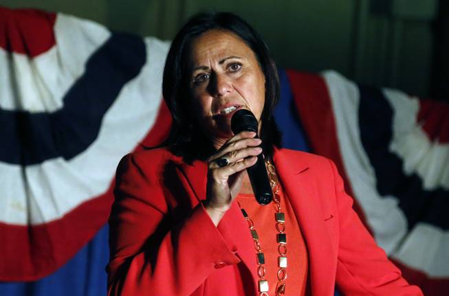 Democratic state Sen. Angela Giron gives her concession speech after she lost in a recall vote in Pueblo, Colo., Tuesday Sept. 10, 2013. Two Colorado state lawmakers who backed gun-control measures in the aftermath of the mass shootings in Colorado and Connecticut last year have been ousted in recall elections.