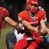 Photo: Arbor View quarterback Andrew Cornwell dishes off Photo: Arbor View quarterback Andrew Cornwell dishes off