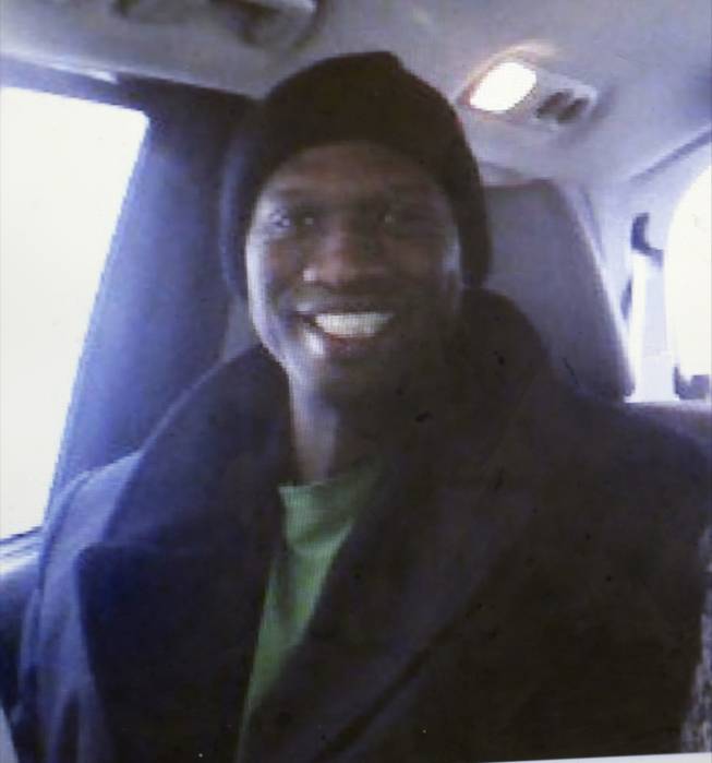 This undated cell phone photo provided by Kristi Kinard Suthamtewakul shows a smiling Aaron Alexis in Fort Worth, Texas. The FBI has identified Alexis, 34, as the gunman in the Monday, Sept. 16, 2013 shooting rampage at at the Washington Navy Yard in Washington that left thirteen dead, including himself.