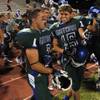 Green Valley players celebrate their win over Palo Verde Friday, Sept. 20, 2013. Green Valley won the game in overtime 42-41. Green Valley players celebrate their win over Palo Verde Friday, Sept. 20, 2013. Green Valley won the game in overtime 42-41.