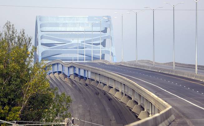 A span on the Leo Frigo Memorial Bridge in Green Bay shows signs of buckling Wednesday, Sept. 25, 2013, in this view looking west. Authorities say a section of the Interstate 43 bridge, about 150 to 200 yards long, dipped about three feet across all four lanes. No one has been injured.