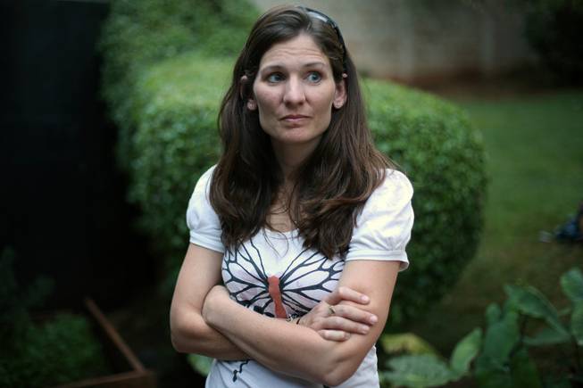 Katherine Walton, 38, from the United States, is photographed during an interview with the Associated Press in Nairobi, Kenya, on Friday Sept. 27, 2013. Walton survived the Westgate Mall attack with her five children and described the moment she nearly came face to face with the attackers as she lay face down.