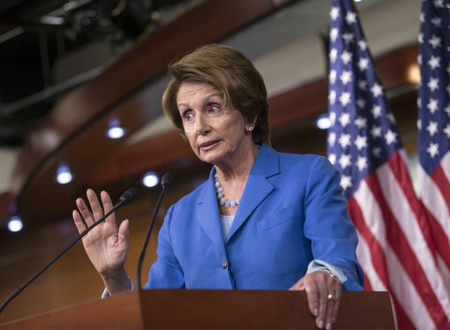 House Minority Leader Nancy Pelosi, D-Calif., speaks with reporters about the looming deadline to fund the government and the fight among House Republicans on a strategy. on Capitol Hill in Washington, Thursday, Sept. 19, 2013. House Republicans vowed Wednesday to pass legislation that would prevent a partial government shutdown and avoid a historic national default while simultaneously canceling out President Barack Obama's health care overhaul, inaugurating a new round of political brinkmanship as critical deadlines approach.