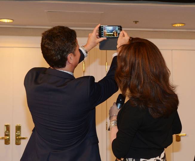 Donny Osmond and Marie Osmond tweet a photo during the renaming of their showroom to Donny & Marie Showroom at Flamingo Las Vegas on Wednesday, Oct. 2, 2013.