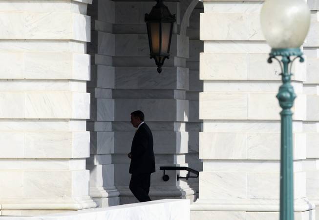 House Speaker John Boehner of Ohio arrives on Capitol Hill in Washington, Thursday, Oct. 3, 2013. The government limped into a third day of partial shutdown Thursday with no sign of a way out after a White House conversation between President Barack Obama and top congressional leaders seemed only to harden the stances of Democrats and Republicans.