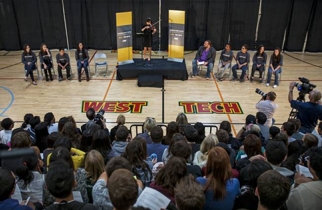 West Career & Technical Academy student Ashley Kim (center)plays violin before classmates Wednesday during the start of the Characters Unite National Tour there. A More Perfect Union: Stories of Prejudice and Power is produced by the USA Network, The Moth and in conjunction with Cox Cable.