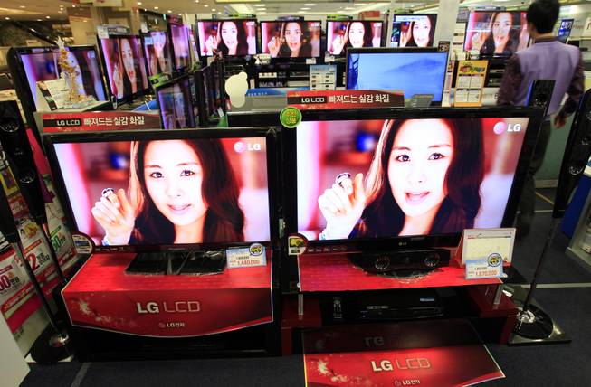 LG Electronics' LCD TVs are displayed at a local electronic department store in Seoul, South Korea, Wednesday, Jan. 26, 2011. LG Electronics, the world's second-biggest manufacturer of flat screen televisions, reported its first quarterly loss in nearly two years amid continued weakness in its mobile phone business. LG Electronics said Wednesday that it lost 256.4 billion won ($229.4 million) in the three months that ended Dec. 31.