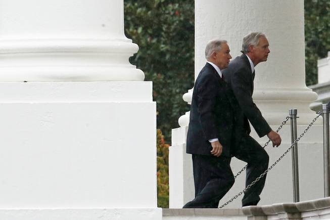 Sen. Ron Johnson, R-Wis., right, and Sen. Jeff Sessions, R-Ala., arrive with other Republican senators at the North Portico of the White House in Washington, Friday, Oct. 11, 2013, to meet with President Barack Obama regarding the government shutdown and debt ceiling. After weeks of ultimatums, President Barack Obama and congressional Republicans are exploring whether they can end a budget standoff that has triggered a partial government shutdown and edged Washington to the verge of a historic, economy-jarring federal default.