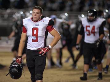 Las Vegas High linebacker Jacob Anderson (9) walks off the field Friday, Oct. 11, 2013, after Las Vegas lost to Green Valley 39-38.