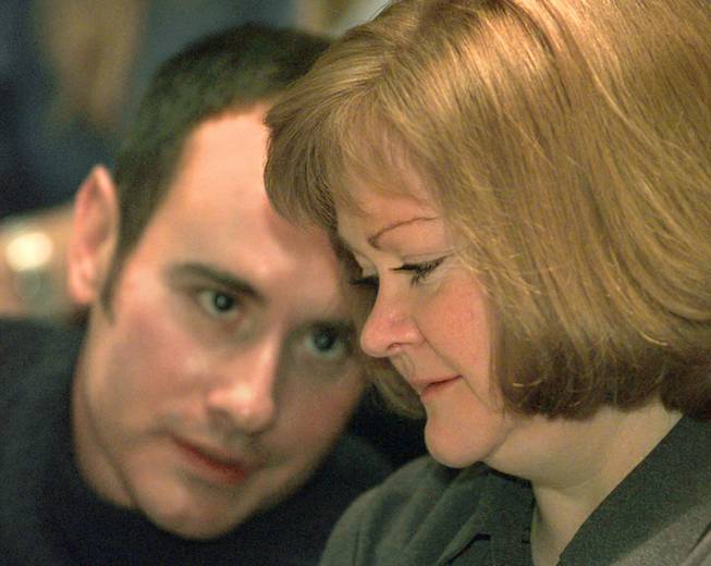 Judy Shepard is comforted by filmmaker Martin Bedogne as she answers questions from reporters at an anti-Proposition 22 news conference in San Francisco, Thursday, Jan. 27, 2000. Shepard is the mother of Matthew Shepard, who was beaten to death in Wyoming in 1998. Proposition 22 would ban California recognition of same-sex marriages.