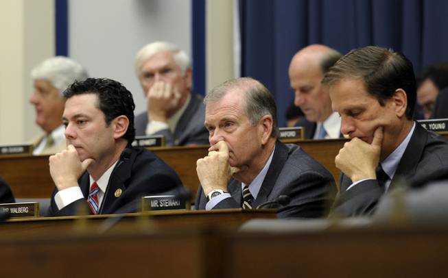 Rep. Jason Chaffetz, R-Utah, left, Rep. Tim Walberg, R-Mich, center, and Rep. Chris Stewart, R-Utah, right, listens during a joint hearing with the House Natural Resources Committee and the House Oversight and Government Reform Committee on Capitol Hill in Washington, Wednesday, Oct. 16, 2013.